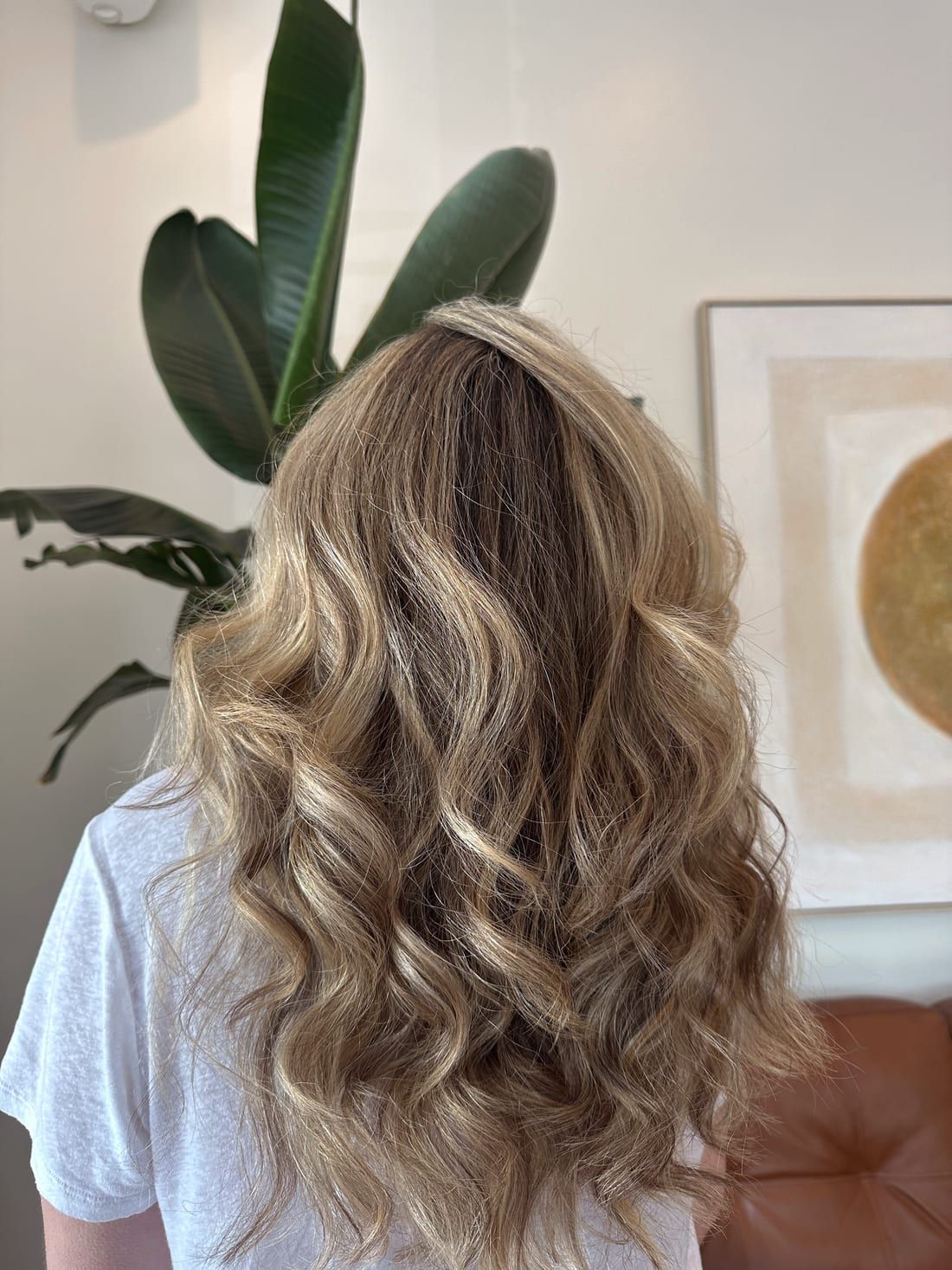 Hand-painted blonde balayage with soft waves, colored at Alora Salon in Pittsburgh