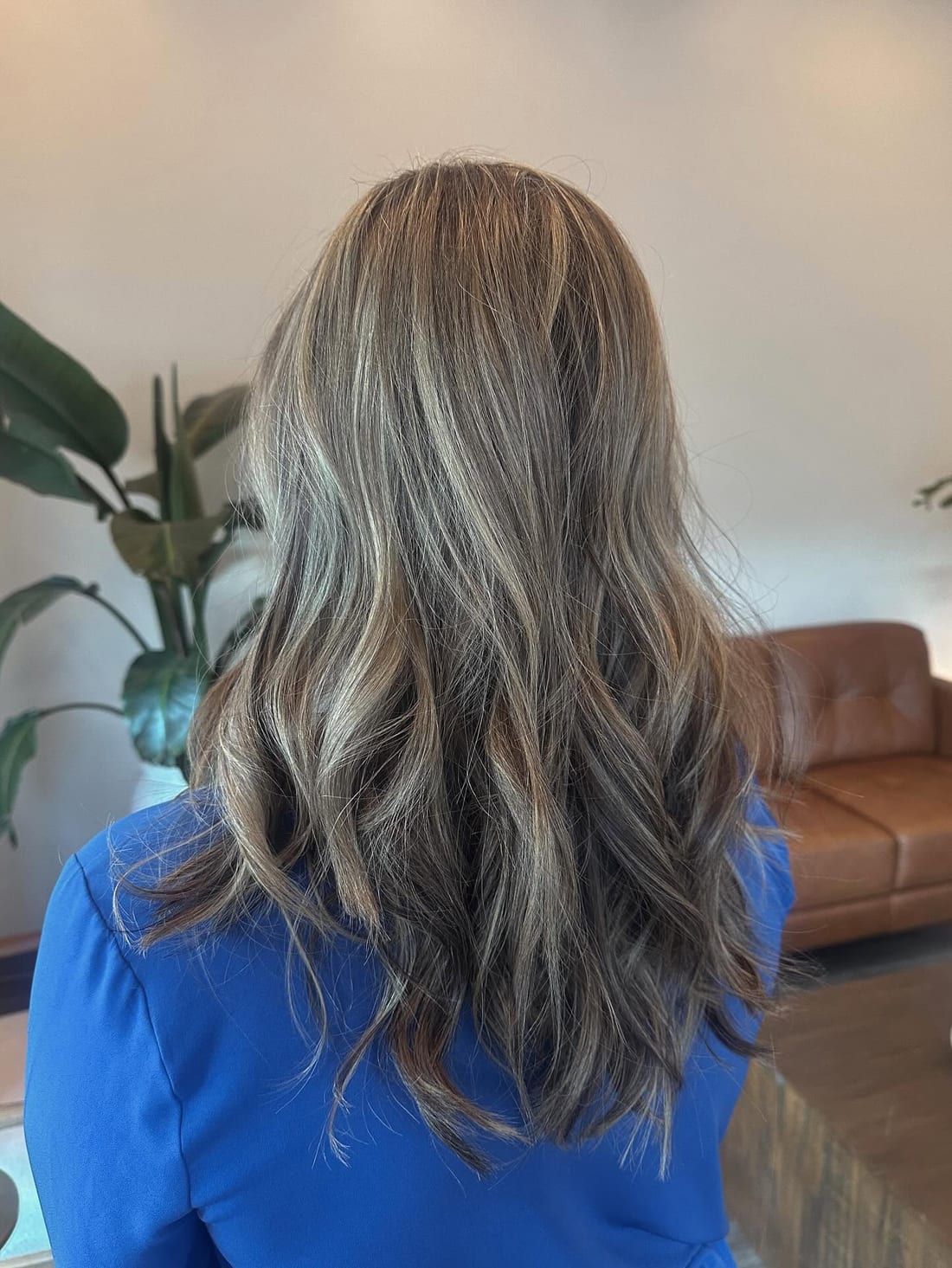 Dimensional ash blonde highlights on long layered hair, colored at Alora Salon in Pittsburgh