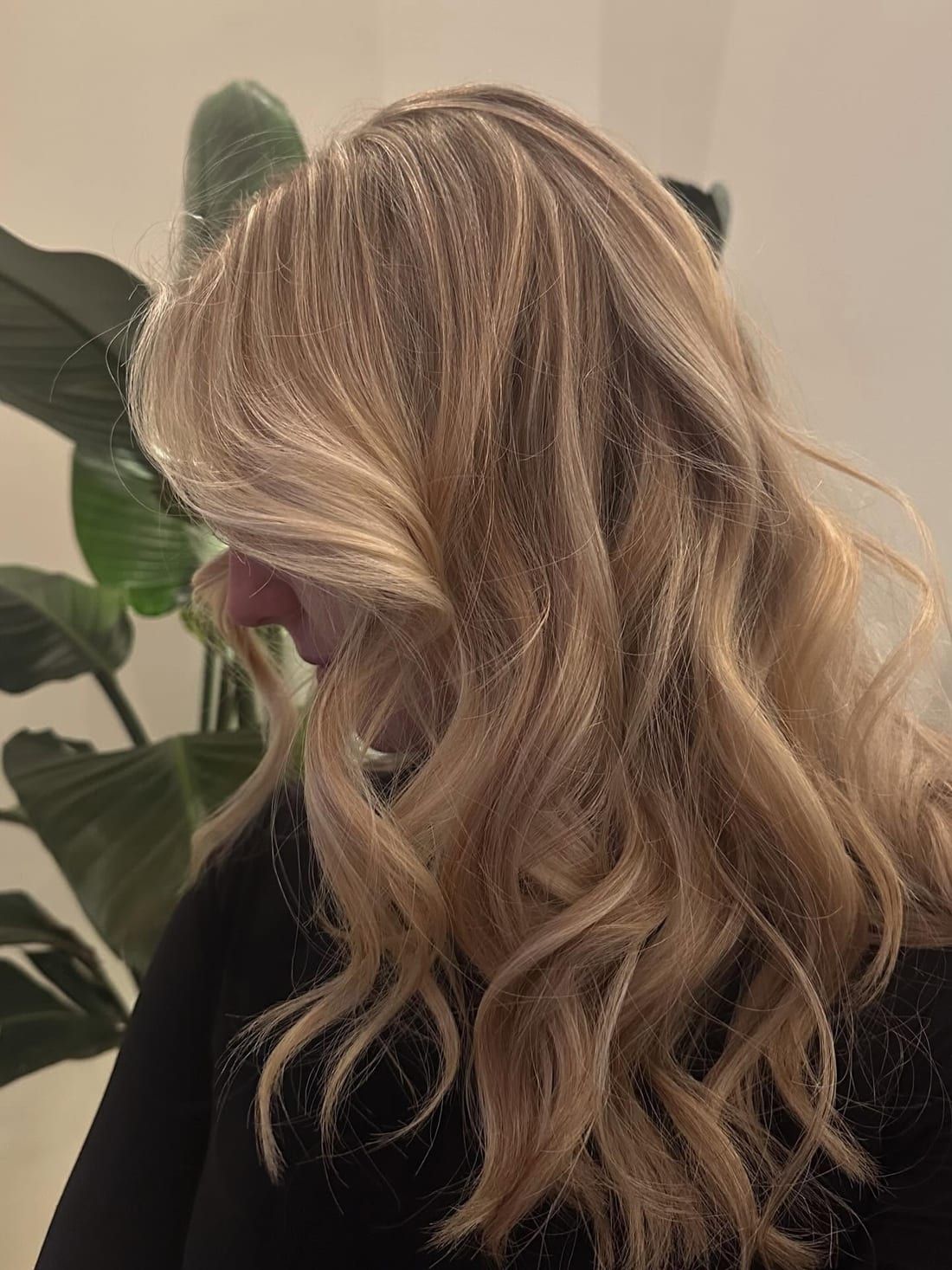 Long hand-painted blonde balayage with soft waves, colored at Alora Salon in Pittsburgh