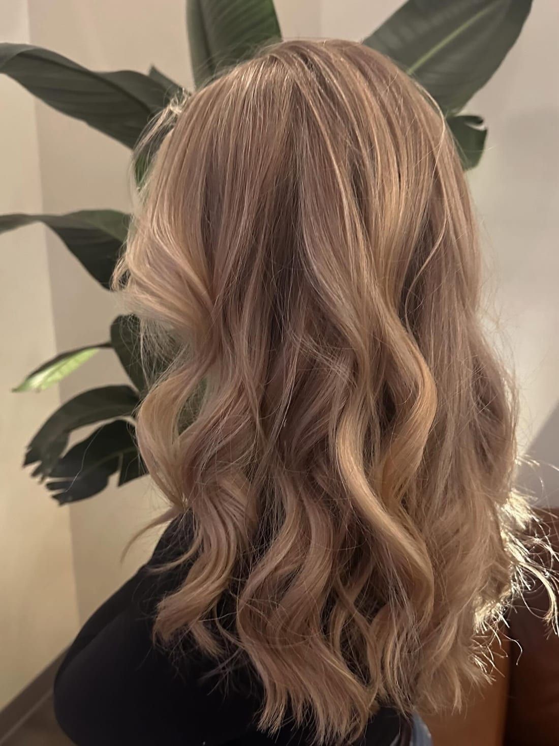 Rose-toned blonde with loose waves, colored at Alora Salon in Robinson Township